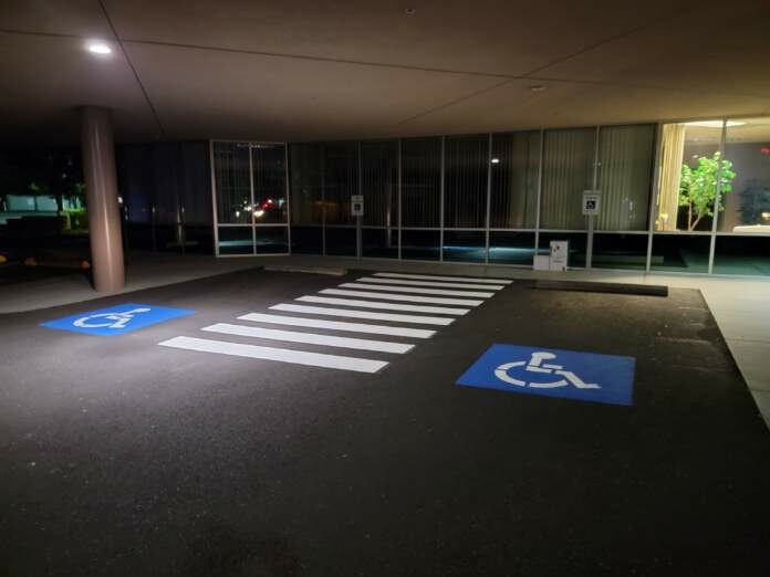 parking lot painting with disability symbols